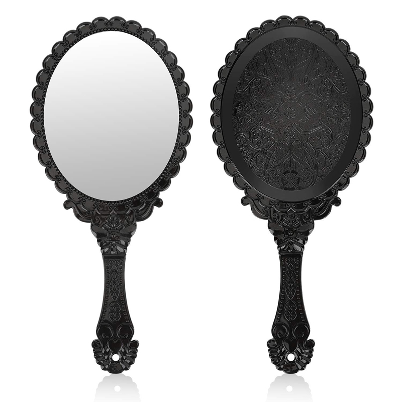 Espejo de mano ovalado vintage negro